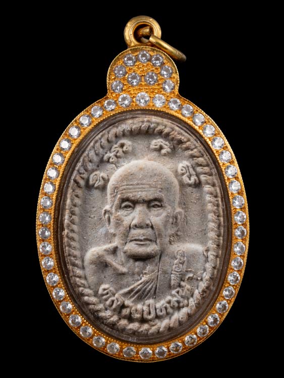 พระผงดวงเศรษฐีหลวงปู่หมุน วัดบ้านจาน พร้อมเลี่ยมทอง